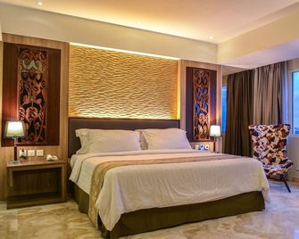 Grand Allison Hotel - Jayapura - Schlafzimmer