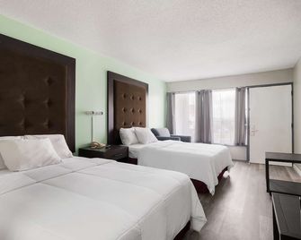 Americas Best Value Inn Suites & Studios Blytheville by Sonesta - Blytheville - Slaapkamer