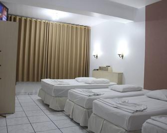 Oasis Chartouni Hotel - Blumenau - Schlafzimmer