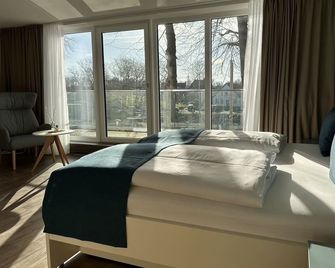 Hotel Schöne Aussicht, Stilvoll modern, direkt am Rüstersieler Hafen - Wilhelmshaven - Makuuhuone