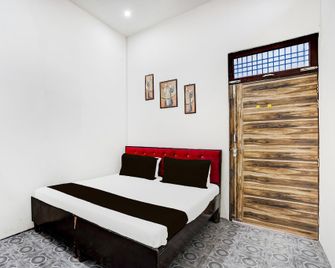 Hotel O Urban Ghar - Hāpur - Bedroom