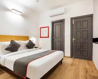 Townhouse Lords Regency - Indore - Κρεβατοκάμαρα