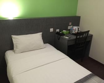 Check Inn Hotel Tawau - Tawau - Slaapkamer