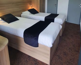 Enzo Hotels Loudeac By Kyriad Direct - Лудеак - Спальня