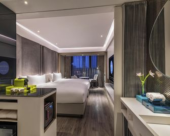 Novotel Yangzhou City Center - האנגז'ו - חדר שינה