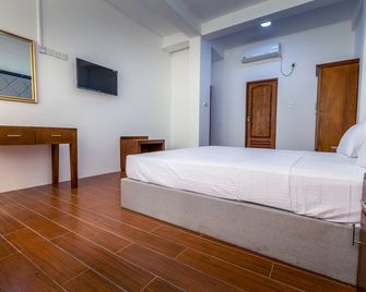 Metro Port City Hotel - קולומבו - חדר שינה