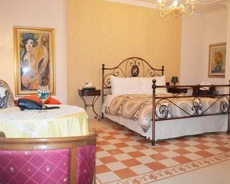 Hotel Palazzo Krataiis - Scilla - Camera da letto