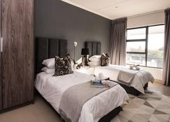 Odyssey Luxury Apartments - Johannesburg - Sypialnia