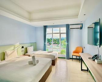 Wing Tat Grand Hotel - Semporna - Bedroom