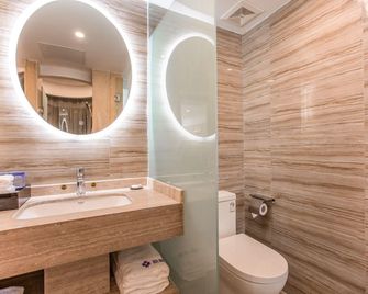 Chizhou Amethyst Hotel - Chizhou - Schlafzimmer