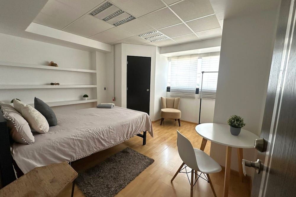 تايني روومز - تولوكا - غرفة نوم