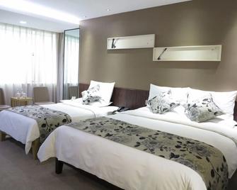 Luoyang Dawei Jiuchao Hotel Xigong - Luoyang - Schlafzimmer