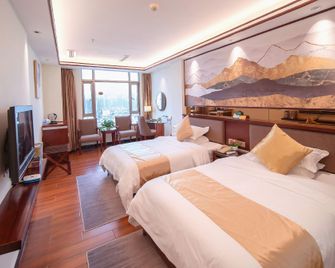 Xinxing Henghui Royal Hotel - Yunfu - Bedroom