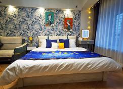 One Bedroom Studio Apartment In Hohhot Cbd Citymall King Size Bed - Hohhot - Schlafzimmer