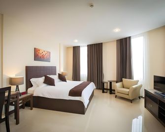 Center Point Boutique Hotel - Vientiane - Phòng ngủ