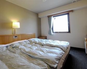 Hotel Route-Inn Nagaizumi Numazu Inter 1 - Nagaizumi - Bedroom