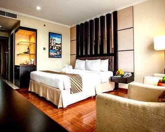 Ros-In Hotel Yogyakarta - Yogyakarta - Κρεβατοκάμαρα