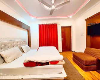 Goroomgo Moon Near Mall Road Nainital - נאיניטל - חדר שינה