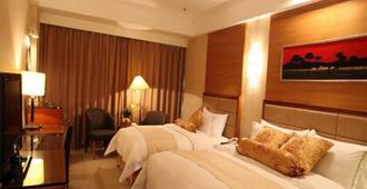 Dongying Blue Horizon Intenational Hotel - Dongying - Bedroom