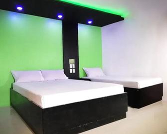 RedDoorz at Ranchotel Bayanan Alabang - Muntinlupa - Slaapkamer