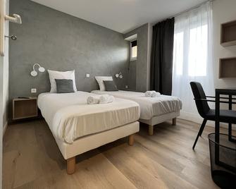 أوتل لو بونسون - اوبينا - غرفة نوم