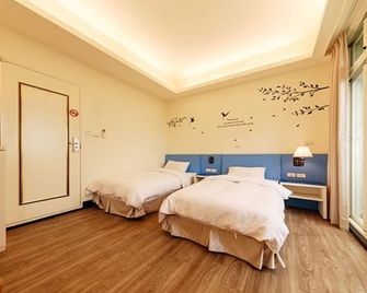 باكباكيرز.إن - Jinning Township - غرفة نوم