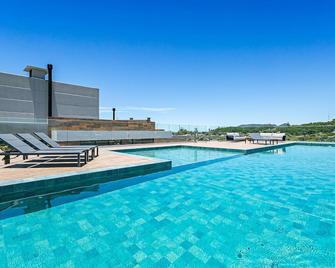 Studios aconchegantes em Floripa - OKA - Florianopolis - Piscine
