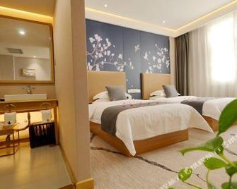 Zhong Yuan Fu Gang Hotel - Xuchang - Bedroom