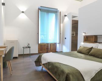 Bohémien Boutique Guesthouse - צ'פאלו - חדר שינה