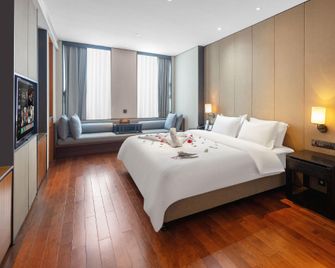 Kun City Resort & Spa - שיאמן - חדר שינה