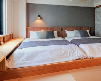 Miyako Daiichi Hotel - Miyakojima - Phòng ngủ