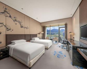 Chongqing Ronghui Grand Hotel - Chongqing - Bedroom