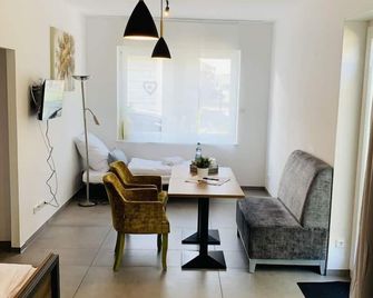 Zimmer Adelheid - Adelheidsdorf - Wohnzimmer