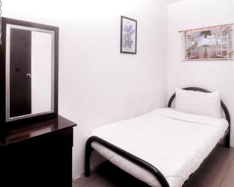 Backpacker's Stay Services - Kuching - Bedroom