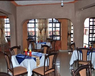 The Orient Hotel - Chuka - Restaurante