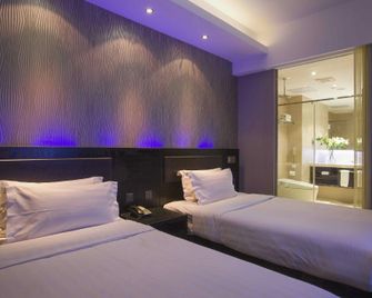 Selected Zhenting Hotels - Nantong - Bedroom