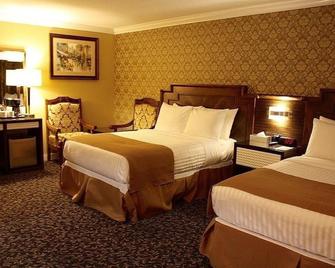 ذا ديلاكس هوتل فانكوفر - فانكوفر - غرفة نوم