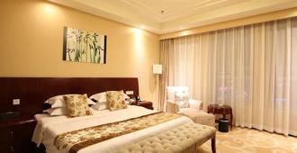 Fuxing Oriental Boutique Hotel - Chifeng - Bedroom