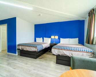 Lamplighter Inn By OYO Independence - Independence - Schlafzimmer