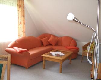 Amaya Hotel & Suites Soltau - Soltau - Вітальня