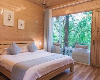 Wuyishan Old Street Sen Live British Inn - Nanping - Bedroom