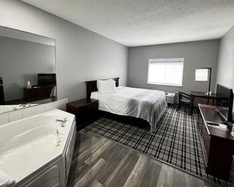 AmericInn by Wyndham Eagle River Downtown - Eagle River - Bedroom