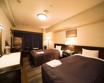 Hotel Claiton Esaka - Suita - Camera da letto
