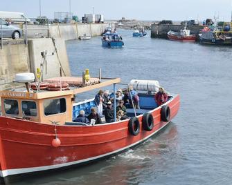 An affordable terraced cottage just 50 yards from the harbour at Seahouses. - Seahouses