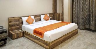 Tobo Syona Residency - Lucknow - Bedroom