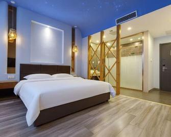 Yanji Feifan Holiday Hotel - Yanbian - Bedroom