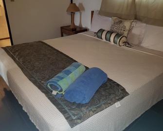 Start your adventure with us on Runway's White Sandy Beach. - St. John's - Bedroom