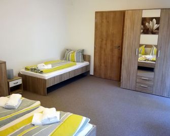 Penzion Dominik - זלזנה רודה - חדר שינה