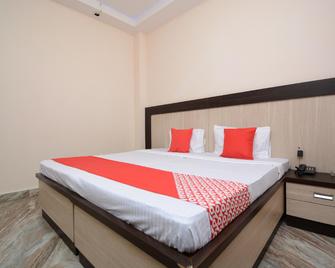 Hotel O Uman Gg - Bathinda - Bedroom