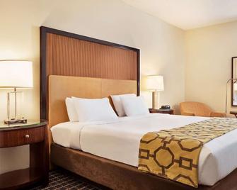 Belmont Inn & Suites - Florida City - Soveværelse